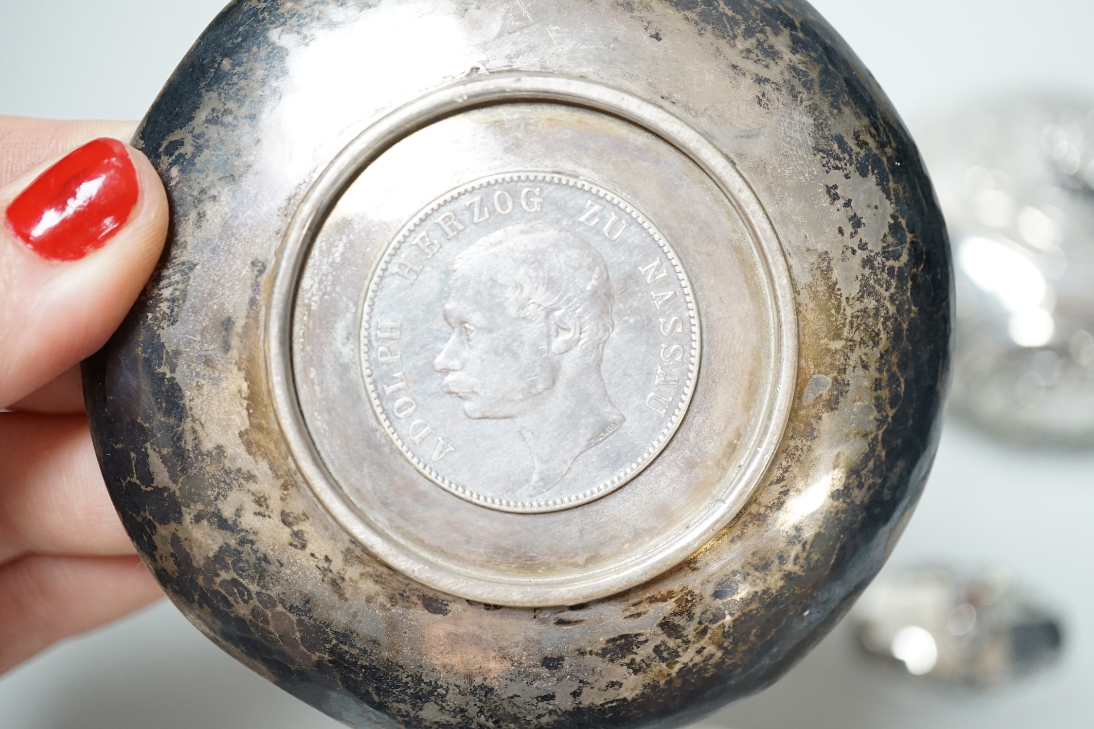 A German white metal jar and cover, dish, mounted jar, paper knife and two trinket boxes